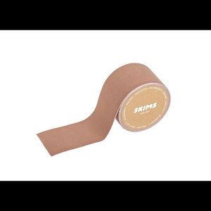 SKIMS body tape tiger eye